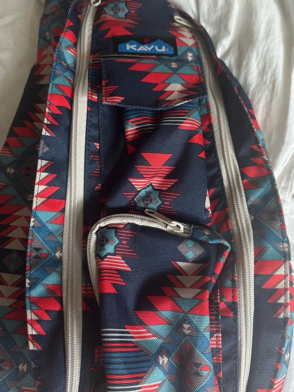 Kavu Navy Red Teal Aztec Sling Bag